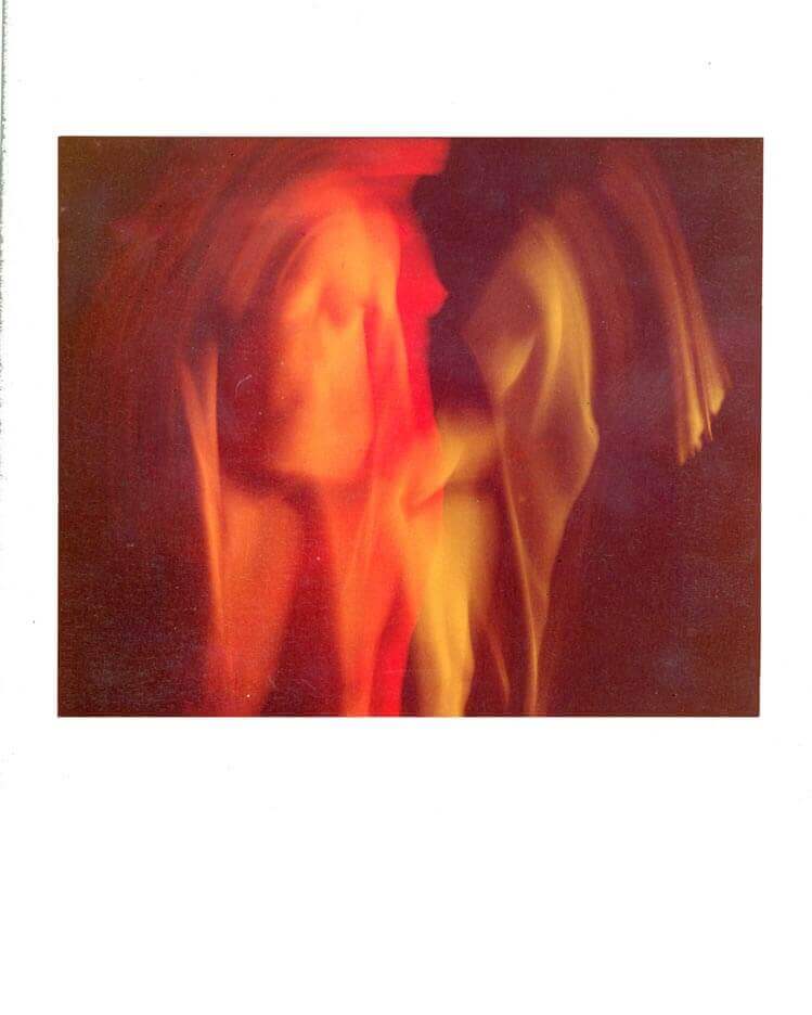 Multiple exposure in color of a nude in my studio at night while I was in grad school 1968